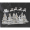 Gray with a winter scene of six snow-covered Christmas trees, with gold ornaments. Above trees is Santa and his sleigh, pulled by 8 reindeer